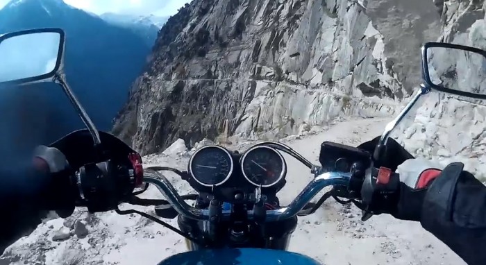 Man Riding Motorcycle on mountain